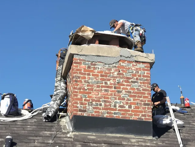 Worthington Chimney Sweep installing a custom chimney crown in Worthington, OH